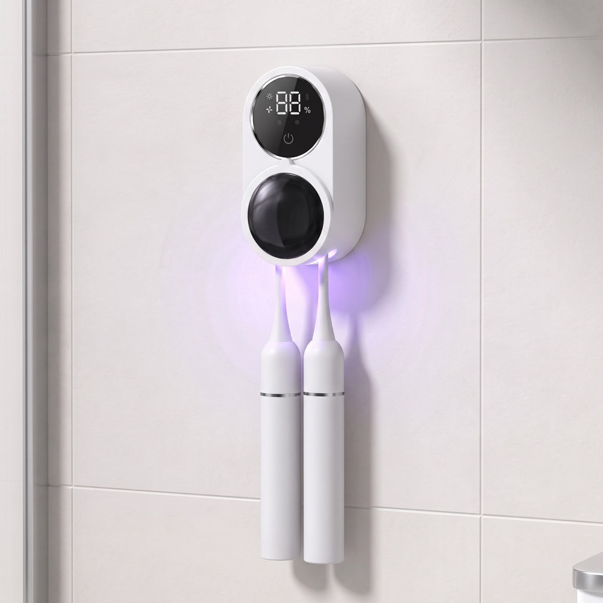 UV toothbrush sanitizer mounted beside a bathroom window, holding two toothbrushes